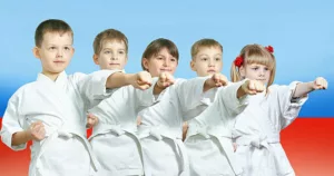 on a red and blue background athletes are beating punch arm